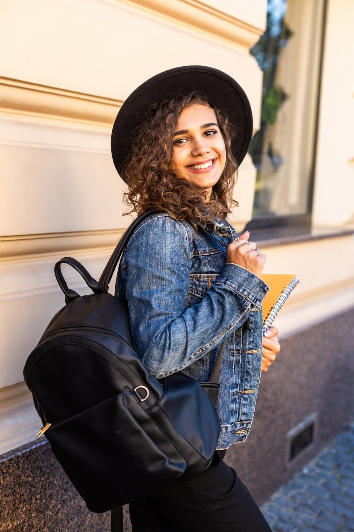Female,College,Student,With,Books,Outdoors
