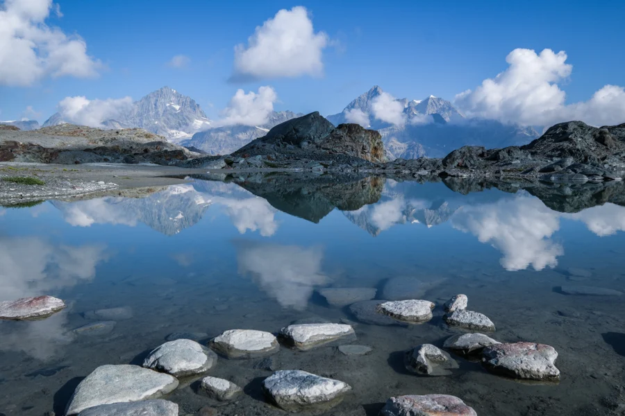 Reflections on a puddle at the Matterhorn Glacier Trail in Zermatt